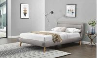 Dvoulůžková čalouněná postel v elegantním provedení