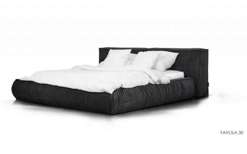 čalouněná postel v jedinečném designu
