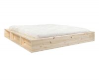 Dvoulůžková postel z masivního dřeva s úložným prostorem