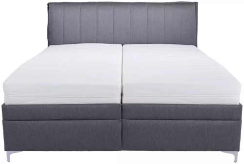 čalouněná manželská postel o rozměru 160x200